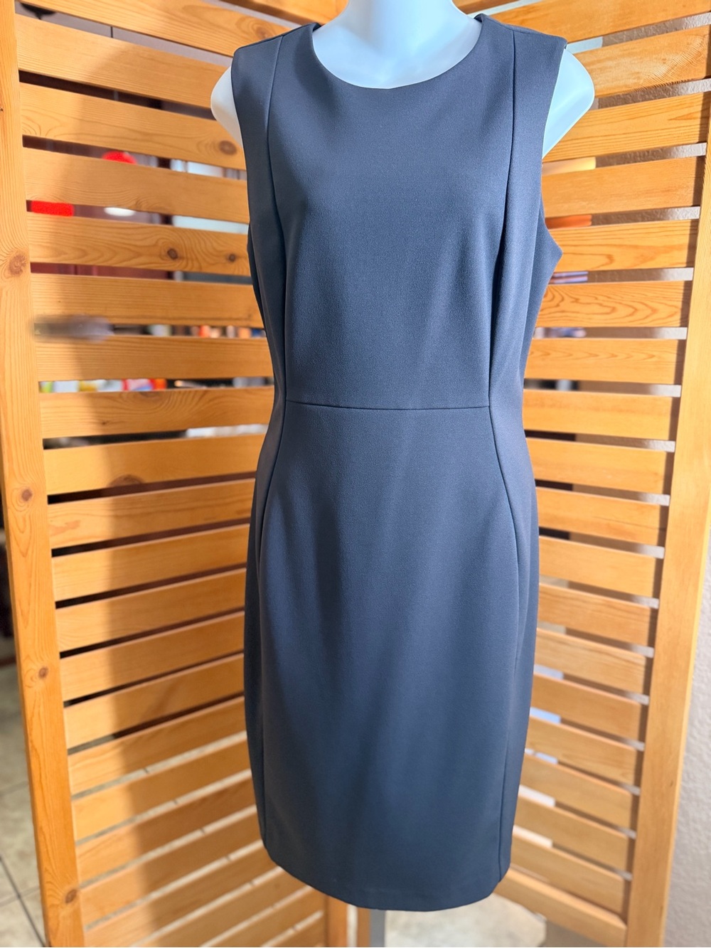 Calvin Klein Sleek Black Sleeveless Midi Sheath Dress